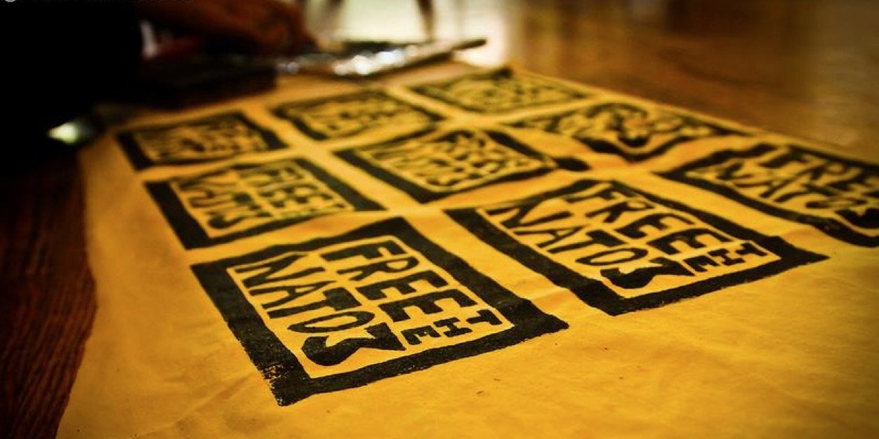 Free the NATO 3 banner