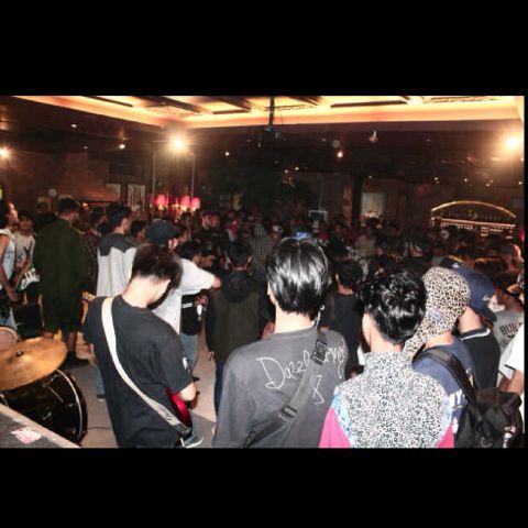 STILL UNDER DOWN banner