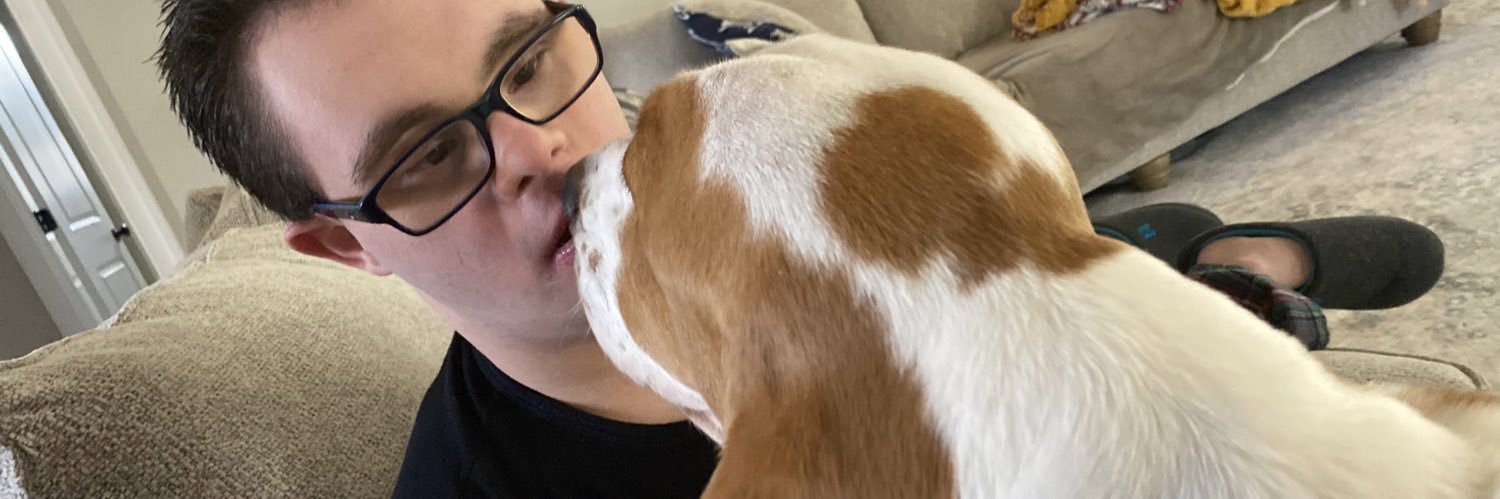 Rhonda and Bryan Harding with Donald and Bella 💜 banner