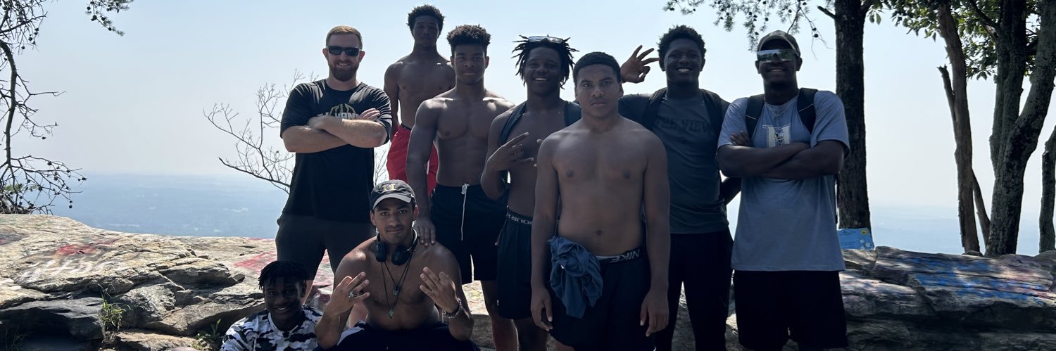 Coach D.J. Brownlee banner