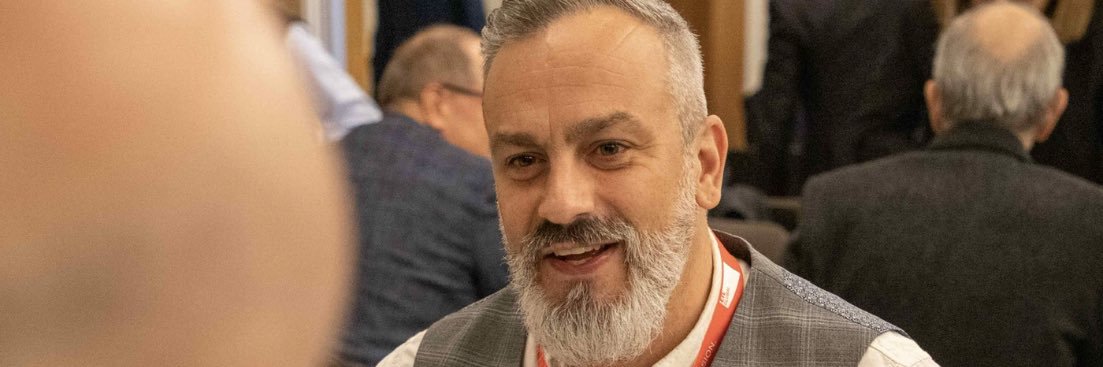 allan merchant banner