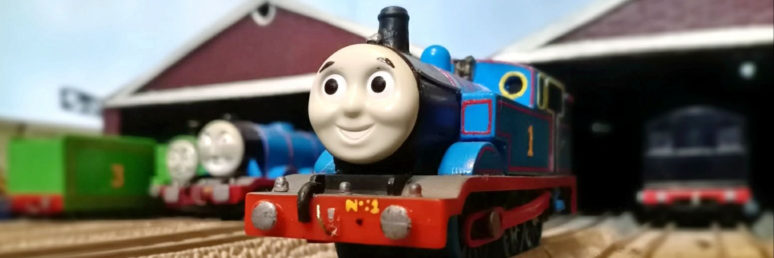 A Kid With Thomas And A Camera banner