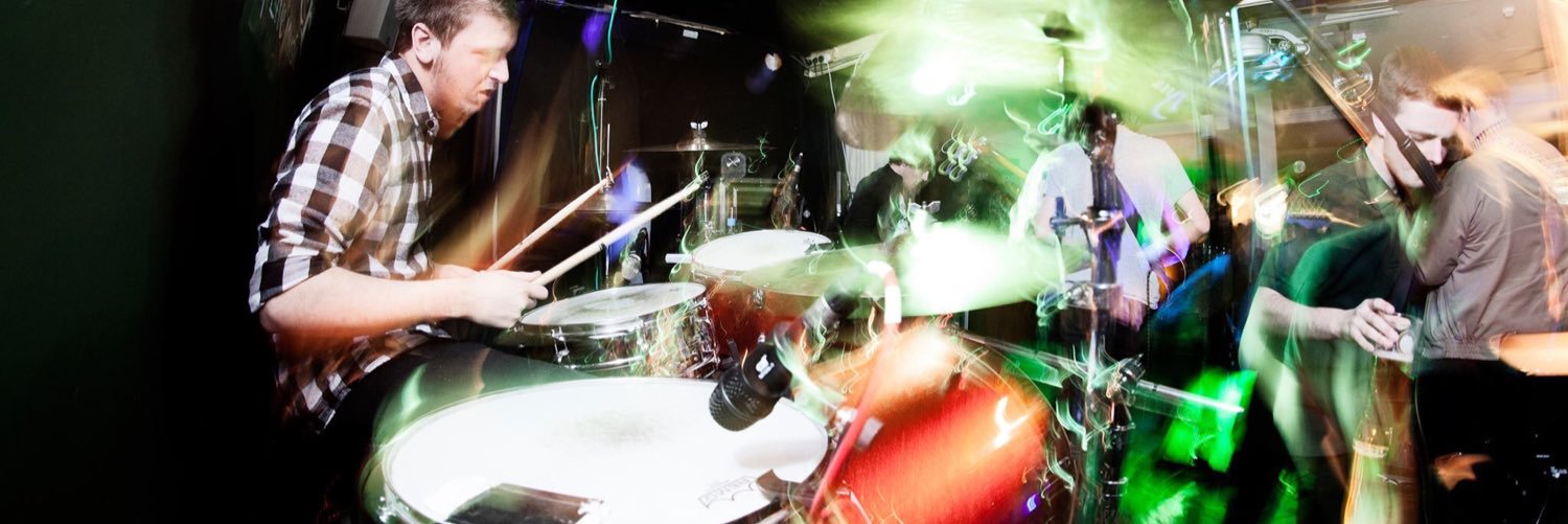 The Queen Riots banner