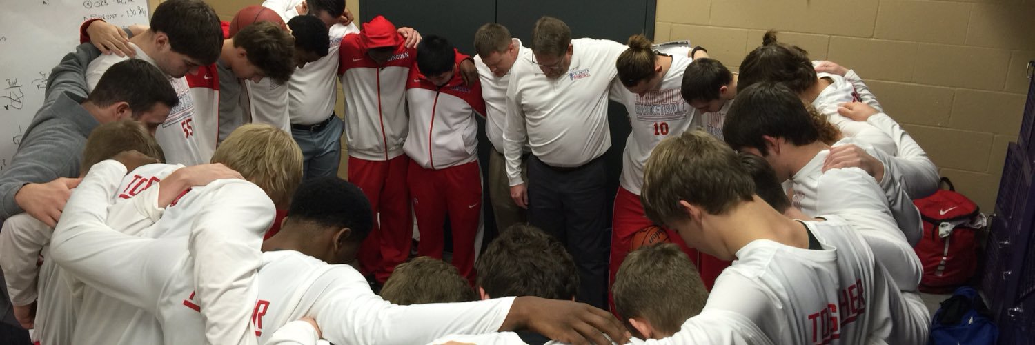 Coach Isaacson banner