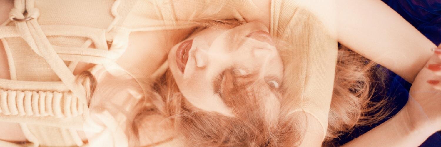 Aura Dione banner