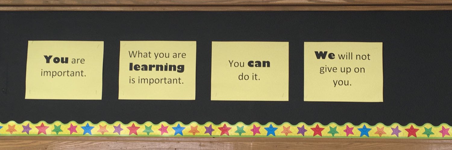 E McCann (she/her) banner