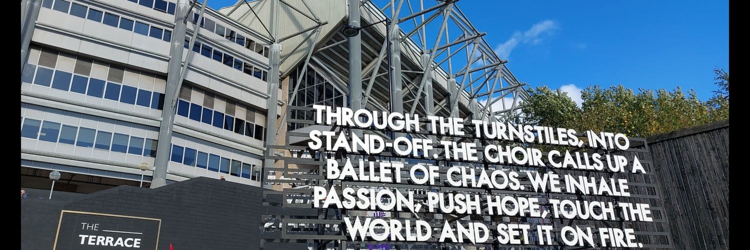 T**t with a cowbell banner
