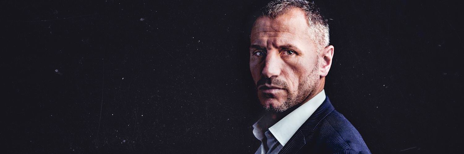 Shefki Kuqi banner