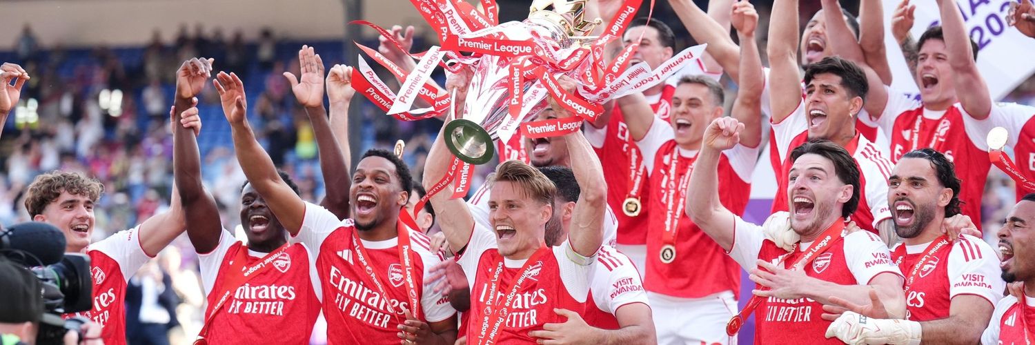 Ayọ̀bámi supports the premier league champions banner