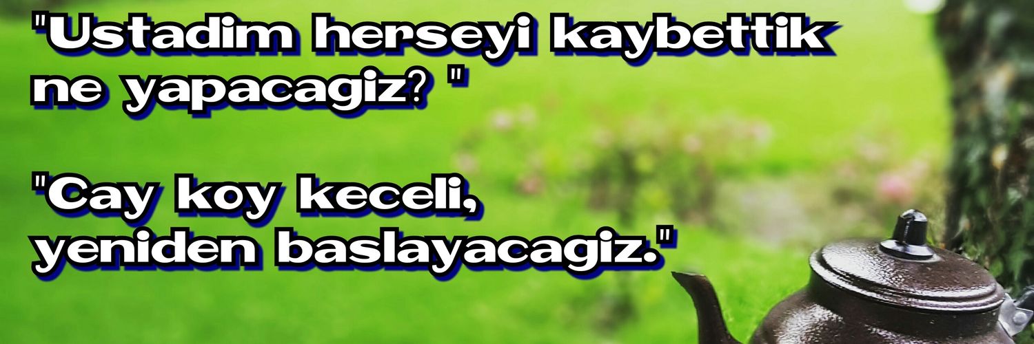 T K banner