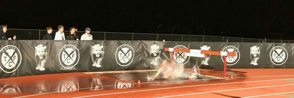 Nolan Catholic Track banner