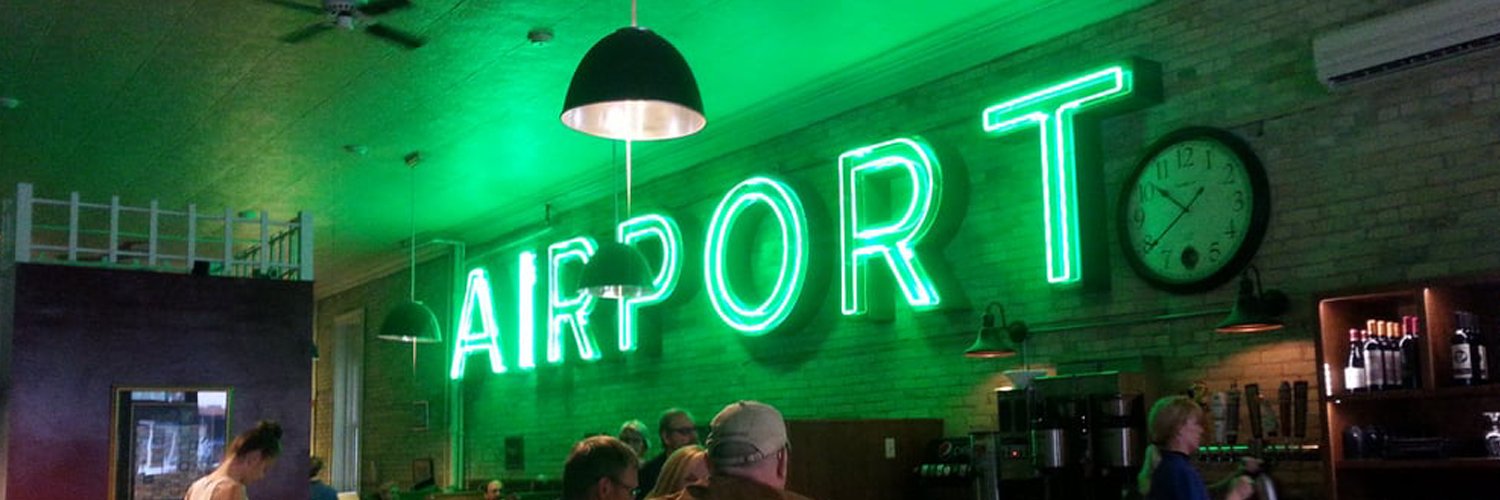 AT The Black & White banner