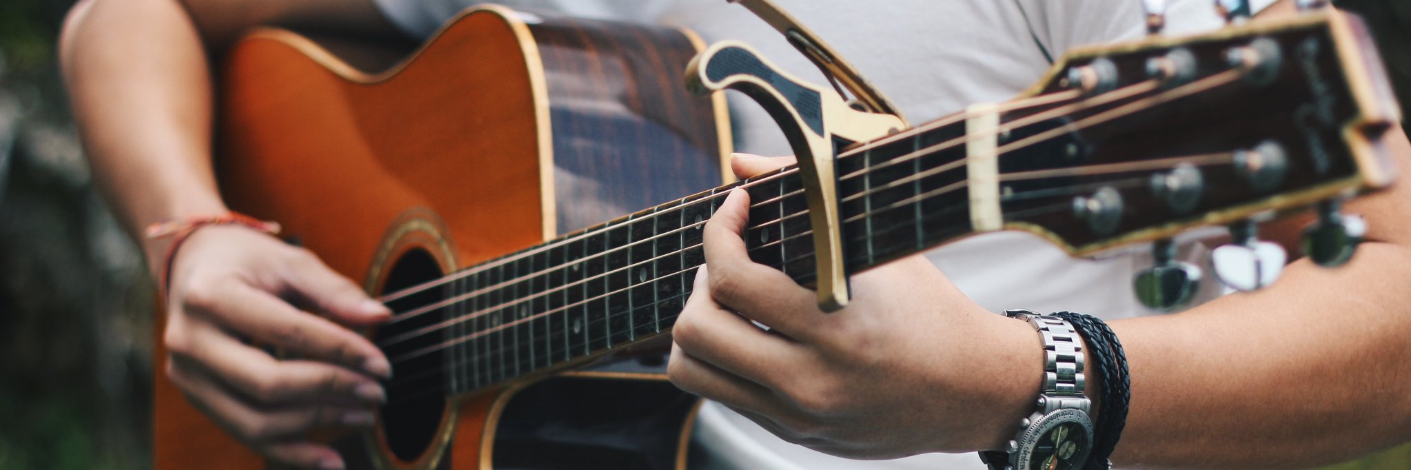 Adrian Tyler Tan banner