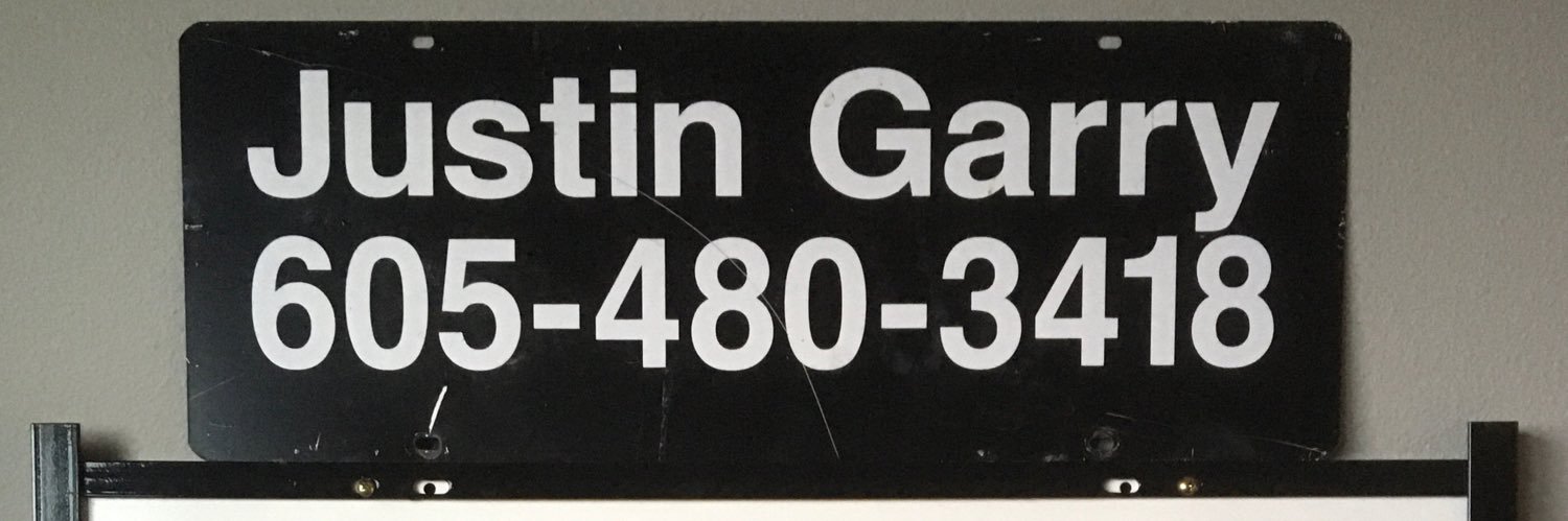 Justin Garry banner