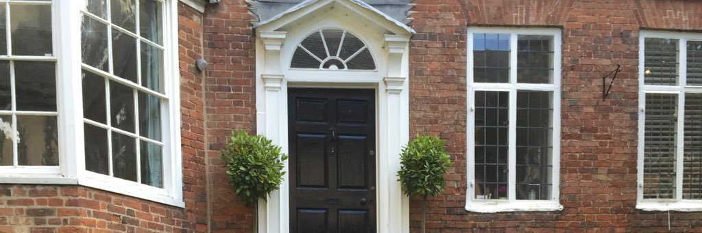 K.E.S. Headmaster banner