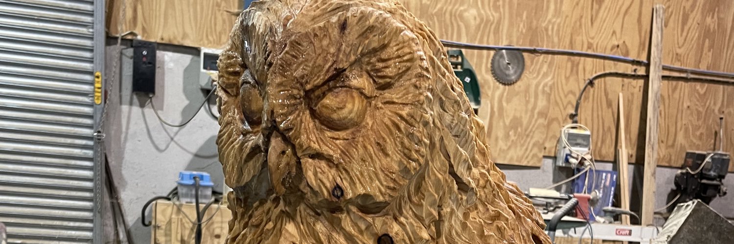 Paul Ed sculpts banner