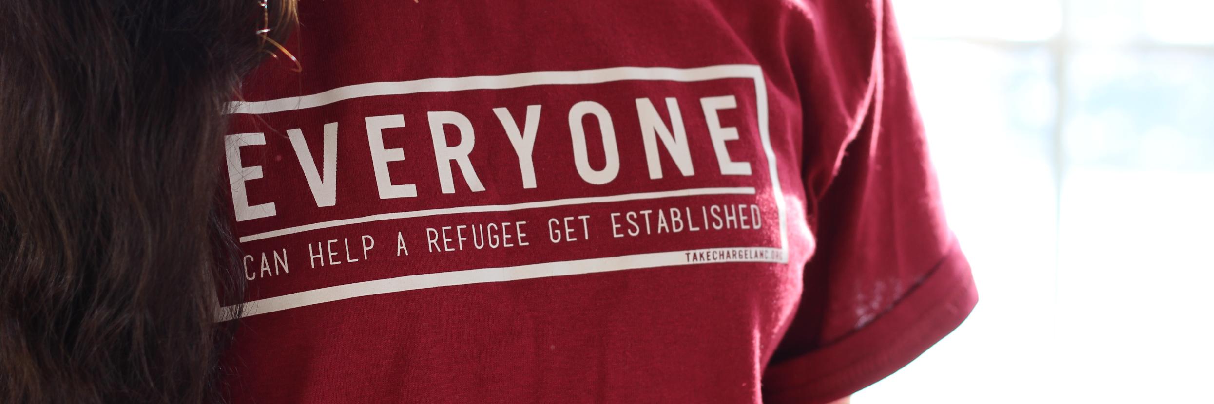 TAK(E) CHARGE banner