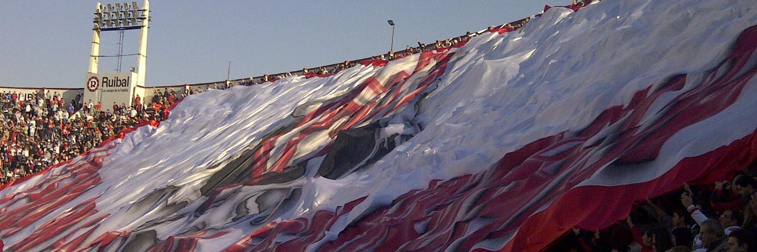 the cat is under the table banner