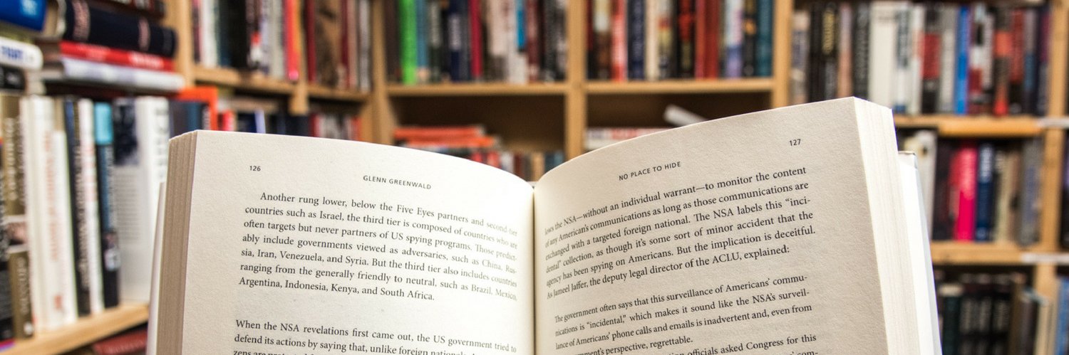 Under Charlie's Covers - Fine Used Books banner