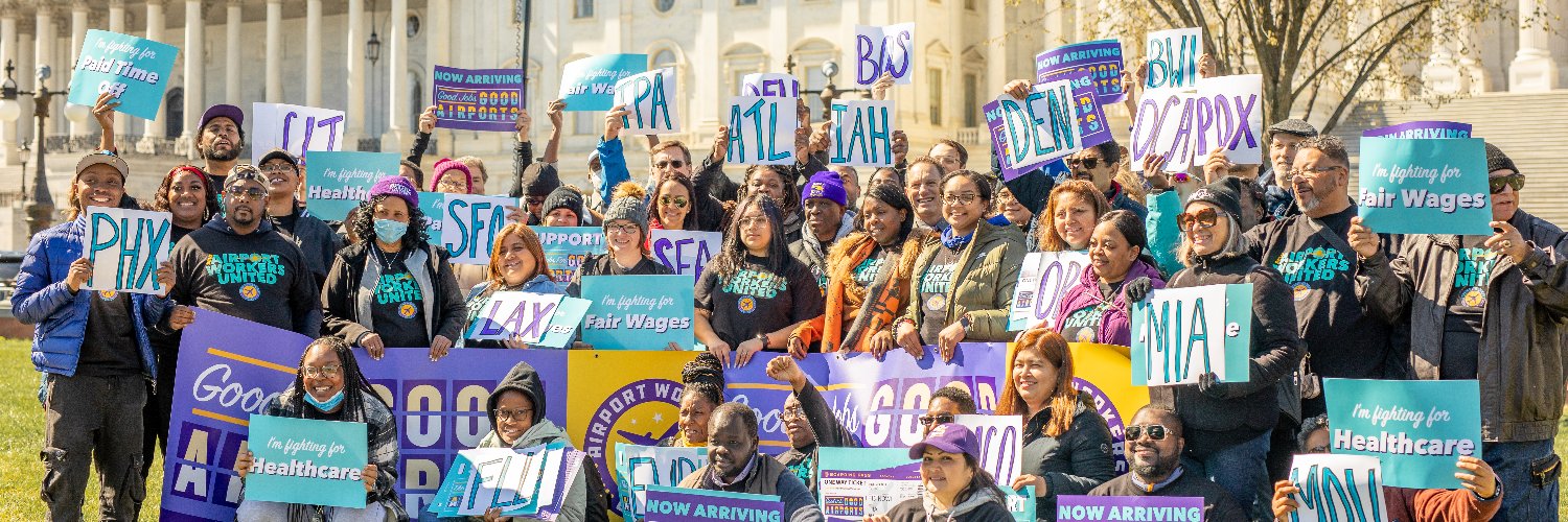 Airport Workers United's banner