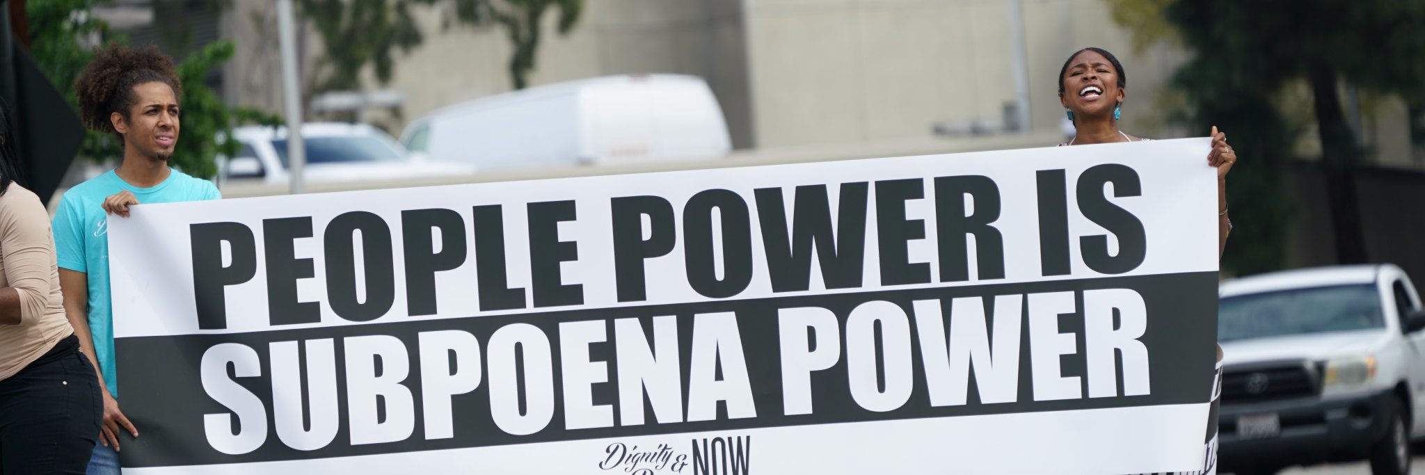 Dignity & Power Now's banner