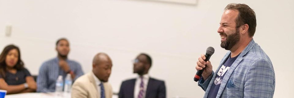 Emmanuel V. Remy banner