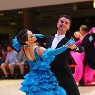 Amateur Ballroom Dancers. Queen and a Court Jester.