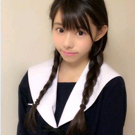 As long as Hitomi Kadokawa is sitting quietly, she is just like any other extremely beautiful high school girl.