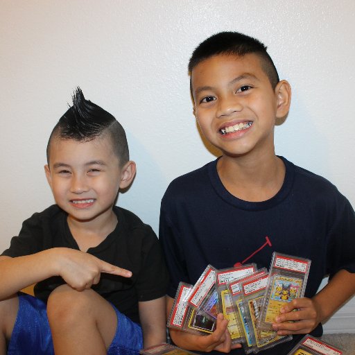We are the Pokemon brothers.  My name is Mikhail and I am 10 years old.  My little brother's name is Reagan and he is 5 years old.  We love Pokemon cards.