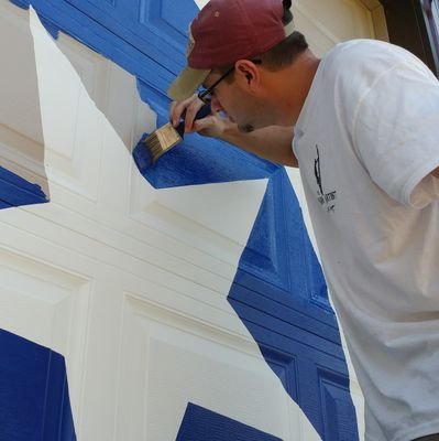 fully insured painter of large signs and murals specializing in barns and school gyms