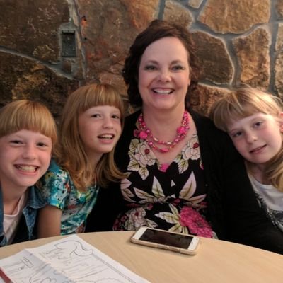 Mother of triplets, elementary librarian, living in small town America. Loving life!