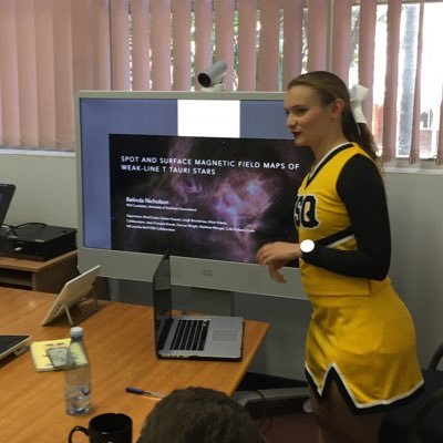 Astrophysics, science communication, cheerleading, Aussie rules football, cats. She/her