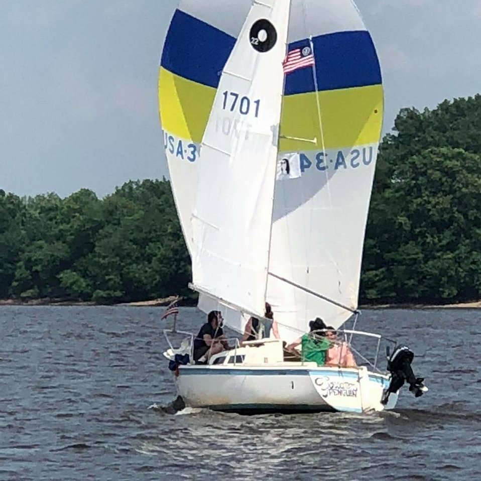 I'm Dan, the owner and skipper of Gossamer Penguin, a 1977 O'Day 22 sailboat. She's short, she's underpowered, and she was never meant for racing. We race her.