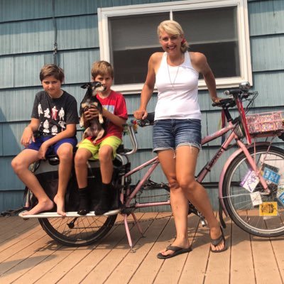 Author URBAN CYCLING: How to Get to Work, Save Money, and Use Your Bike for City Living (@MtneersBooks). Two kids, one small dog, car-free, cargo bikes. she/her