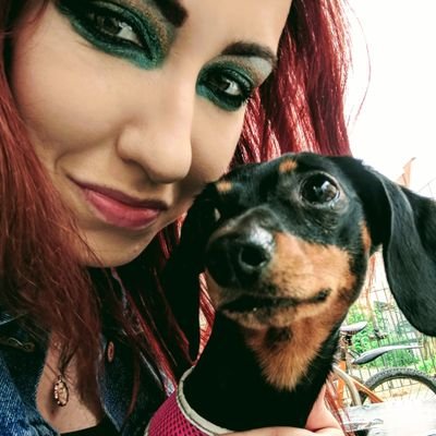 tattoo artist and mother of Poppy the sausage dog queen