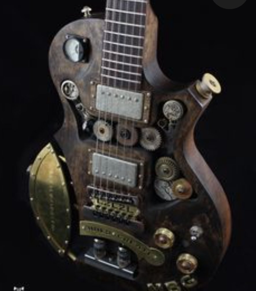 I am a custom Steampunk guitar designed by Kevin Honeycutt and built by amazing American luthier Chris Mitchell at CMG guitars.