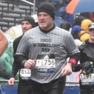 wrestling official, marathon runner, father of three and husband to a babe