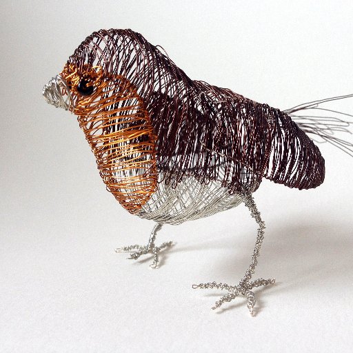 I am a designer/ maker, specialising in metal work and textiles. I make unique wire animals, jewellery, bridal accessories, textile products and much more!