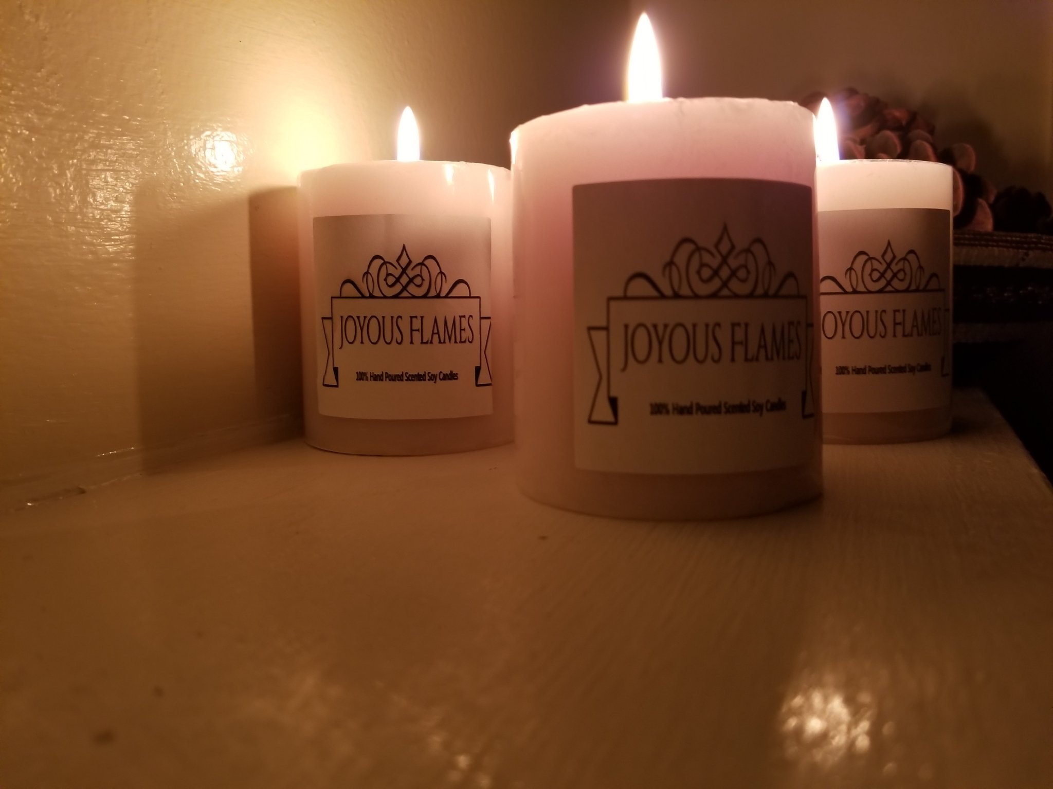 Joyous Flames Candles 
100% Soy Candles 
Experience the Joy