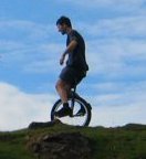 Mountain unicyclist in training, vegetarian, less ecologically sound than I should be