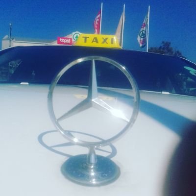 Antics of cab driver and guest in Plettenbergbay, Garden Route, South Africa.