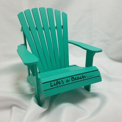 We design and create custom items from wood. Like Adirondack chair Cell Phone Stands, Wine gift boexe and book boxes!