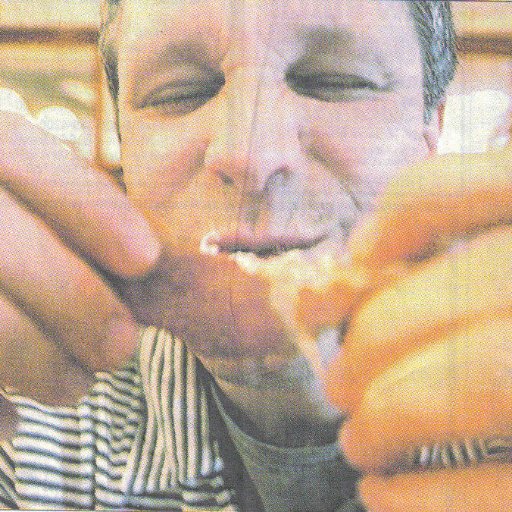 MarkMorelli's profile picture. Me eating Barberton chicken. 
Header image from https://t.co/8n2rbygJ76