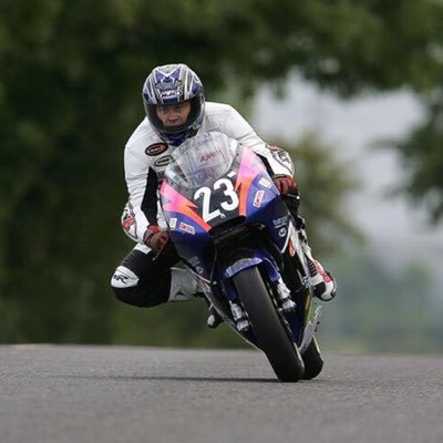 A former British motorcycle racing champion, & champion sidecar driver, Now a Clerk of the course..