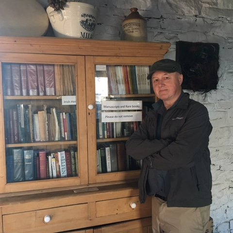 I teach Irish at University College Dublin. The photo shows me in the restored house of the storyteller Seán Ó Conaill under the Dark Sky of South Kerry.