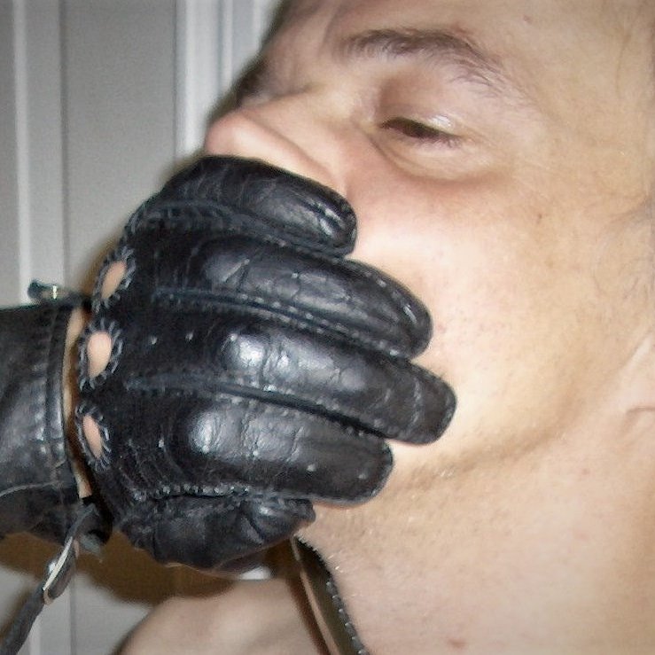 submissive boy into boots, leather, gloves, cigars & bondage.