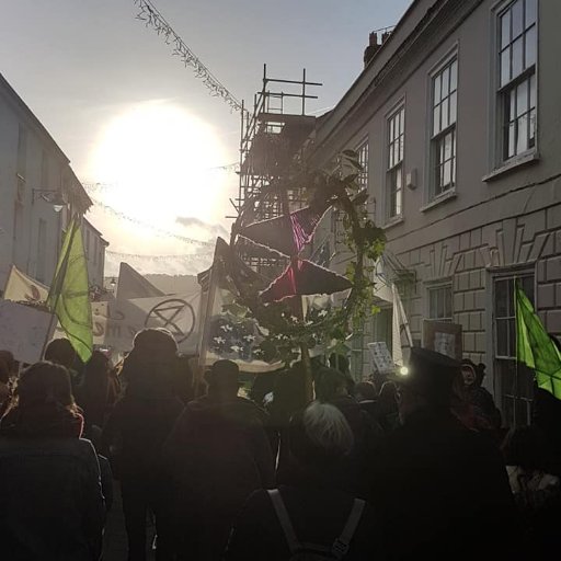 We are Extinction Rebellion. We use non-violent direct action to pressure government to respond to climate change as the existential emergency that it is.