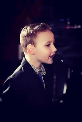 Hi, I am biggest little fan of Robbie Williams. I loves singing Robbie William is and always will be my inspiration. I only hope I can be as good as him one day