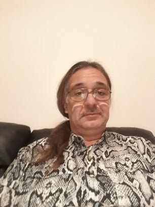 long hair,with a love of rock music,fast cars and motorcycles and sexy ladies