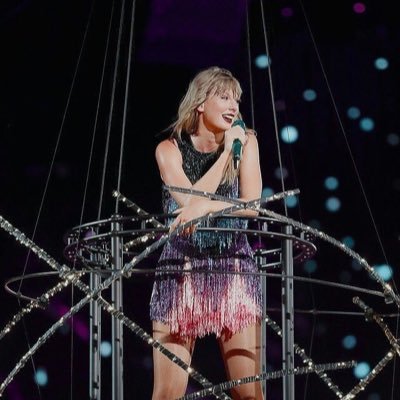 Taylor Swift is a magical fairy of happiness who flutters around singing songs about life. I love that fairy very much.